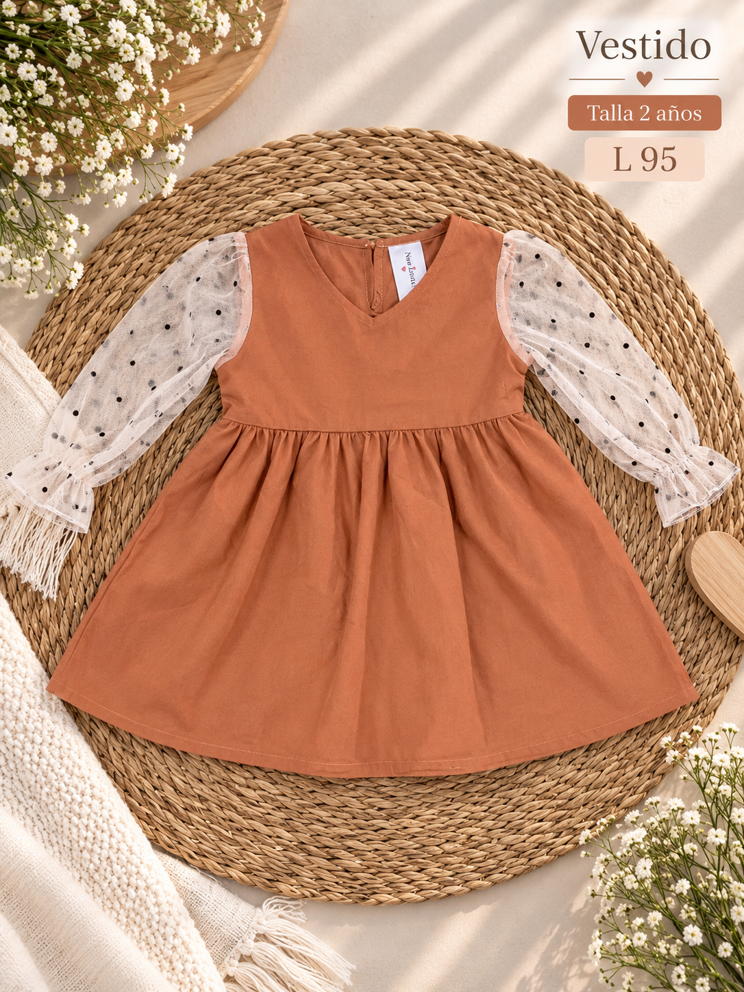 Vestido en color terracota para niña con mangas largas abullonadas y transparentes de lunares