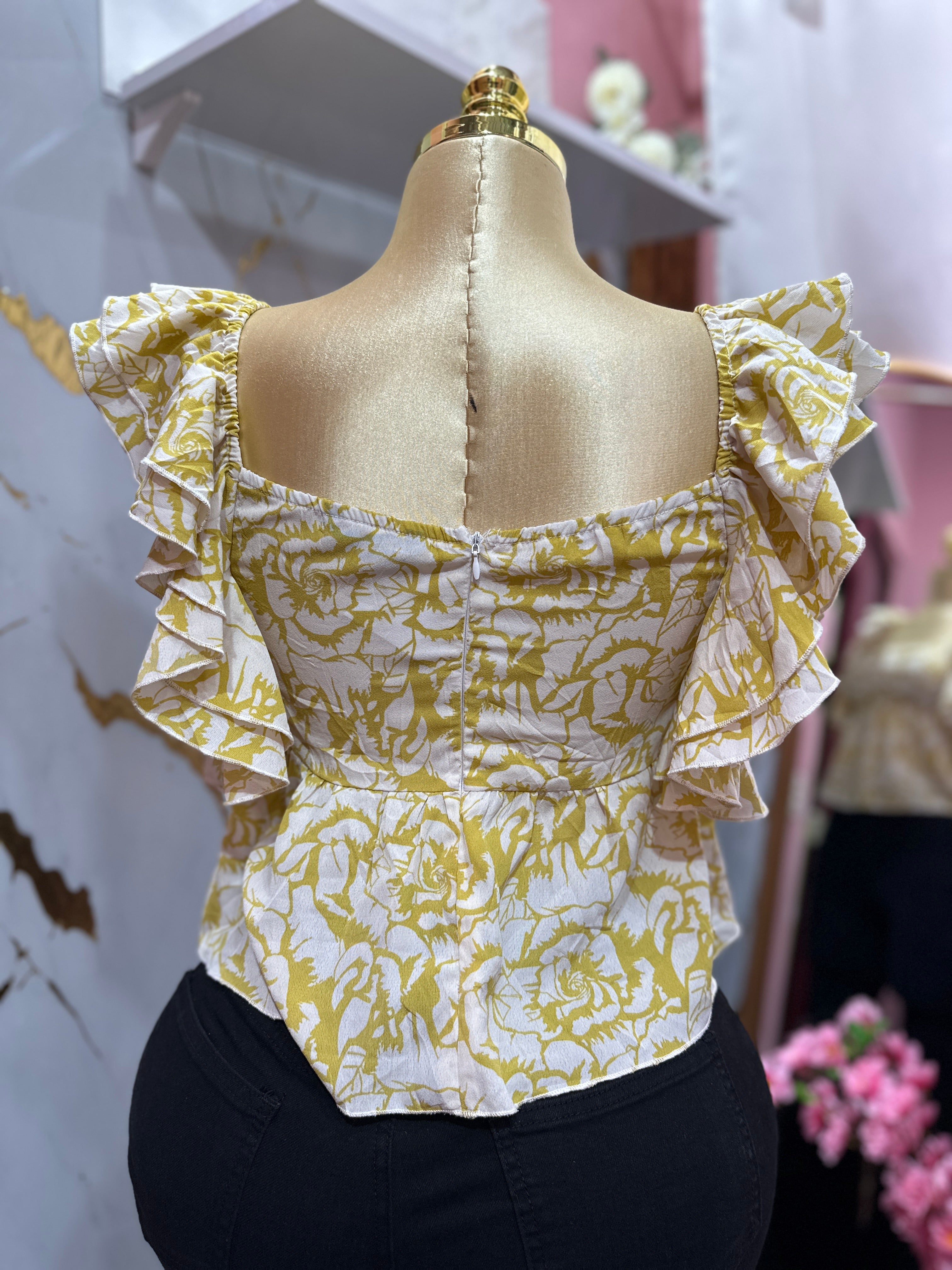 Blusa con estampado floral sutil