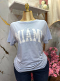 Camiseta de manga corta FREE KISSES en tono azul claro