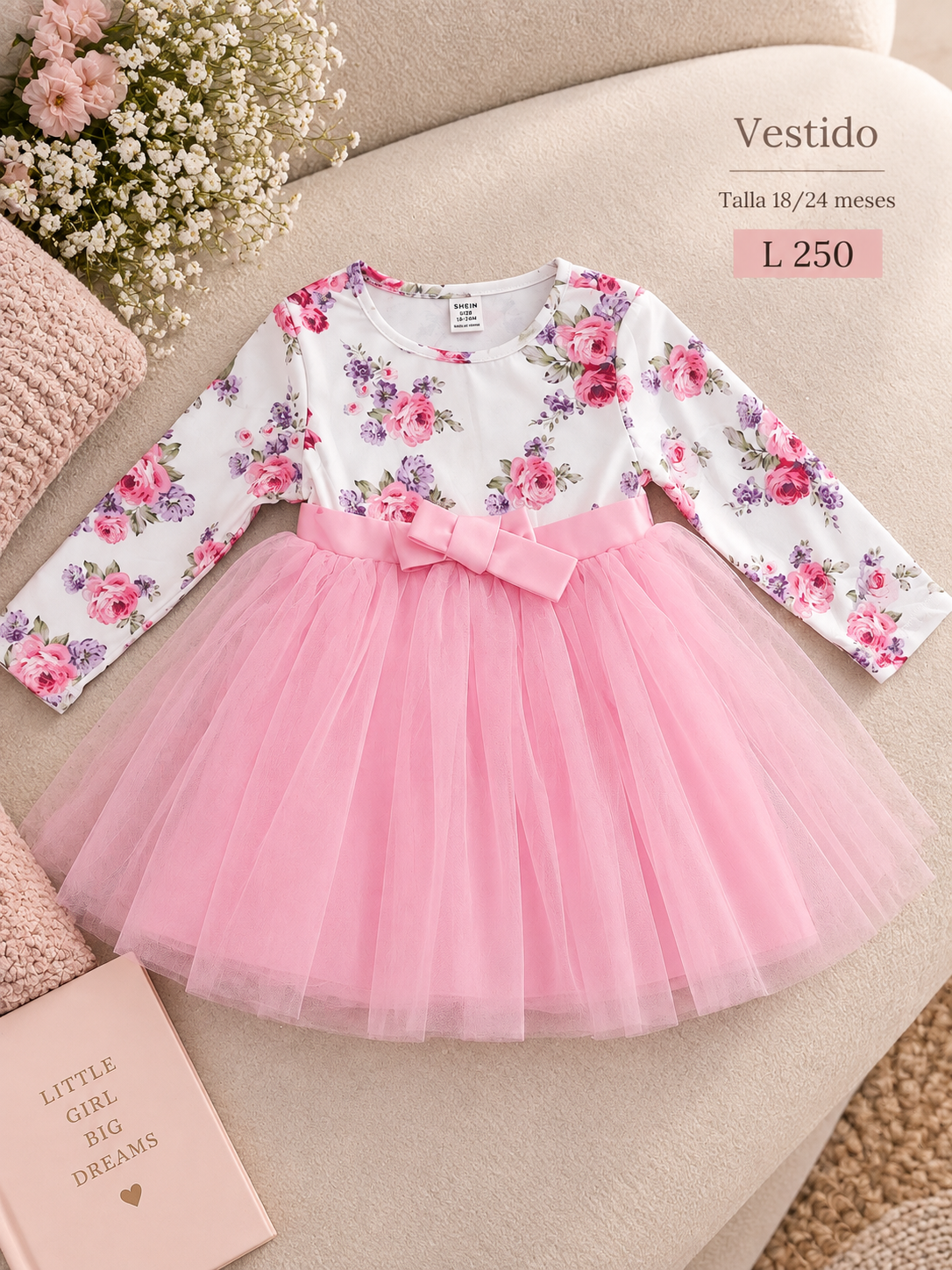Vestido para bebé de manga larga con un estampado floral y una falda de tul rosa