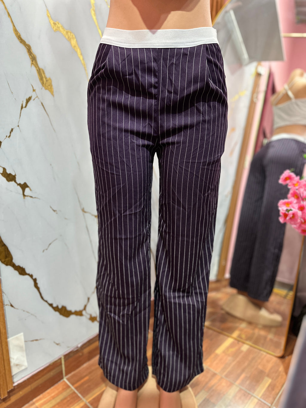 Pantaloneta rayada color morado