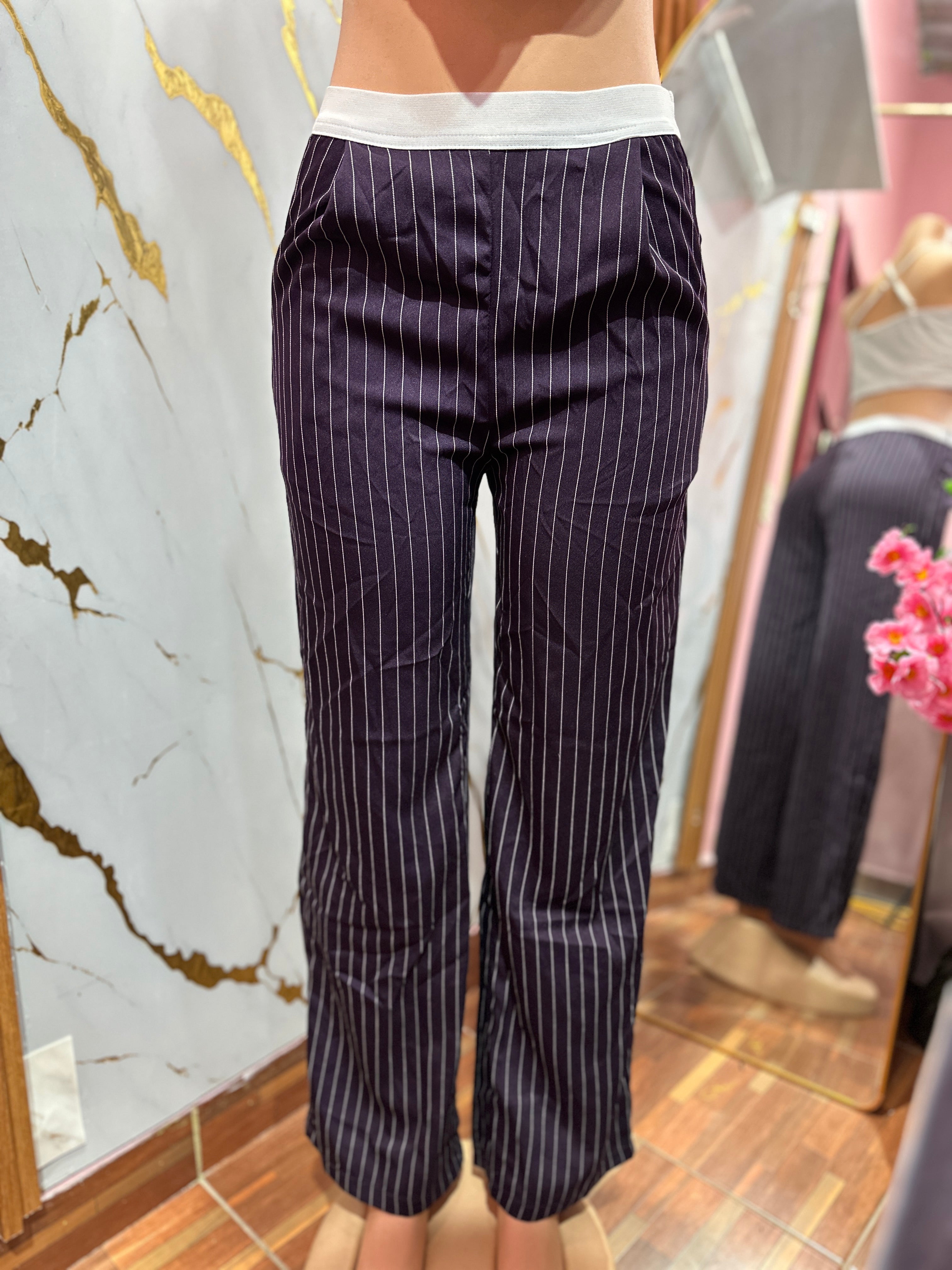 Pantaloneta rayada color morado