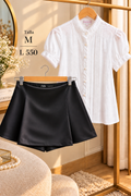 Conjunto para dama, falda short oscura con una blusa blanca de manga corta
