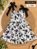 Vestido blanco para niña con estampado floral oscuro y tirantes decorados con lazos negros