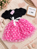 Vestido para niña de tul rosa con lunares blancos y un lazo decorativo al frente
