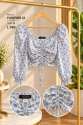 Top de manga larga con estampado floral y con diseño fruncido al frente