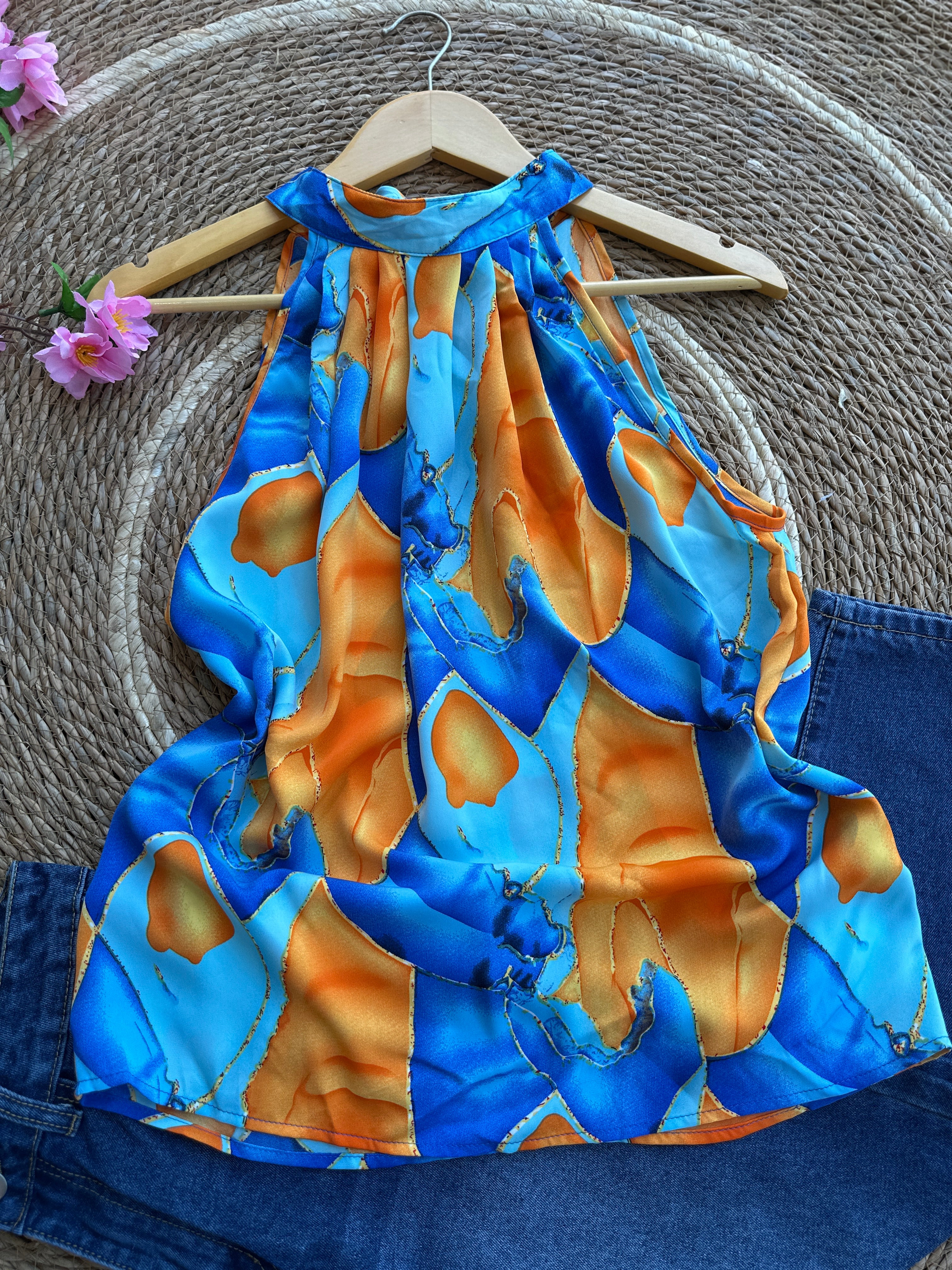 Blusa con cuello halter con estampado abstracto