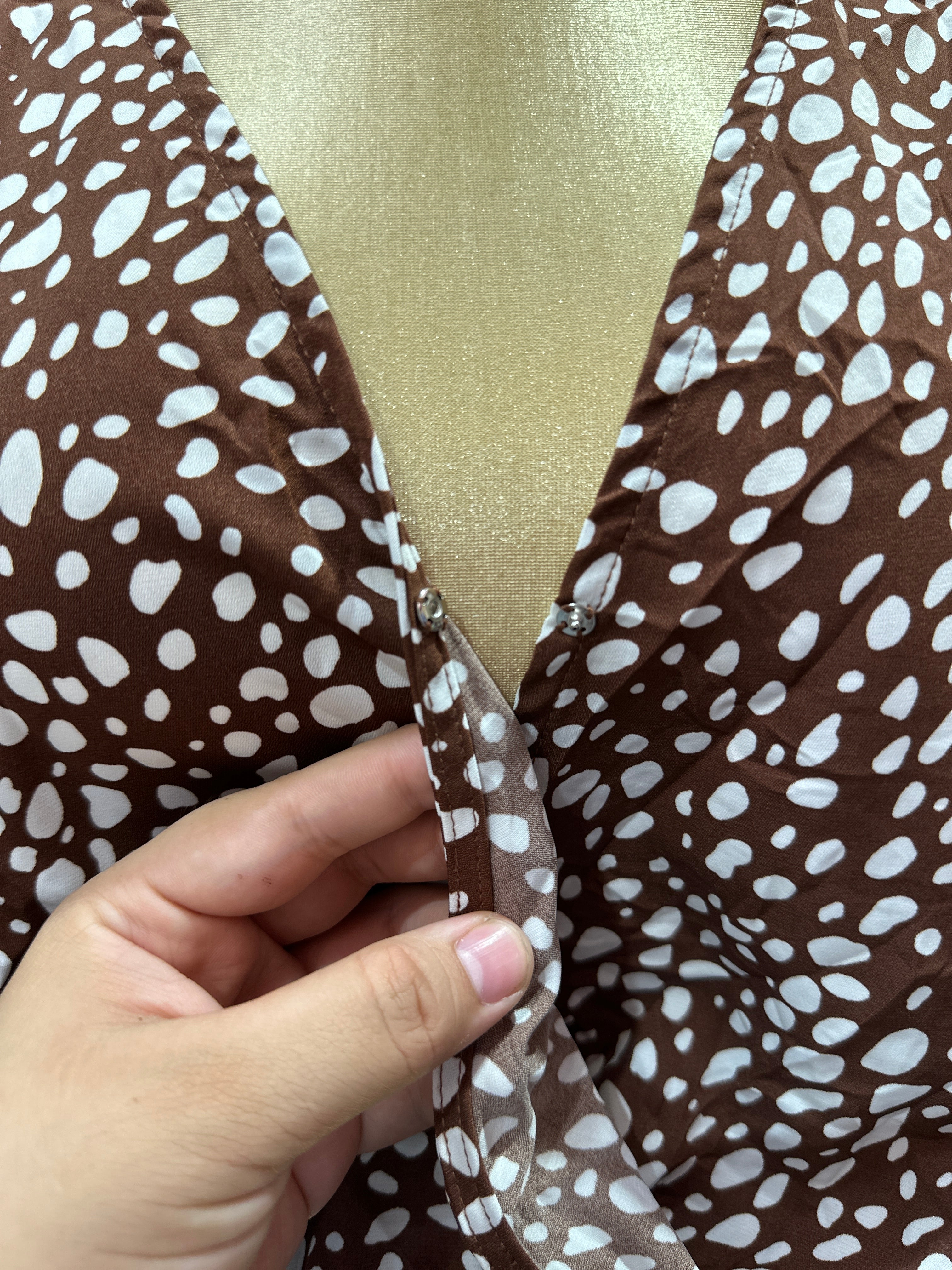 Jumpsuit holgado con estampado, cuello en V cruzado