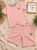 Conjunto para niño, Camiseta y Calsoneta con cordón de color rosado