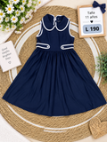 Vestido para niña azul marino sin mangas con detalles blancos en contraste