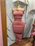 Vestido elegante color rosa con diseño ajustado