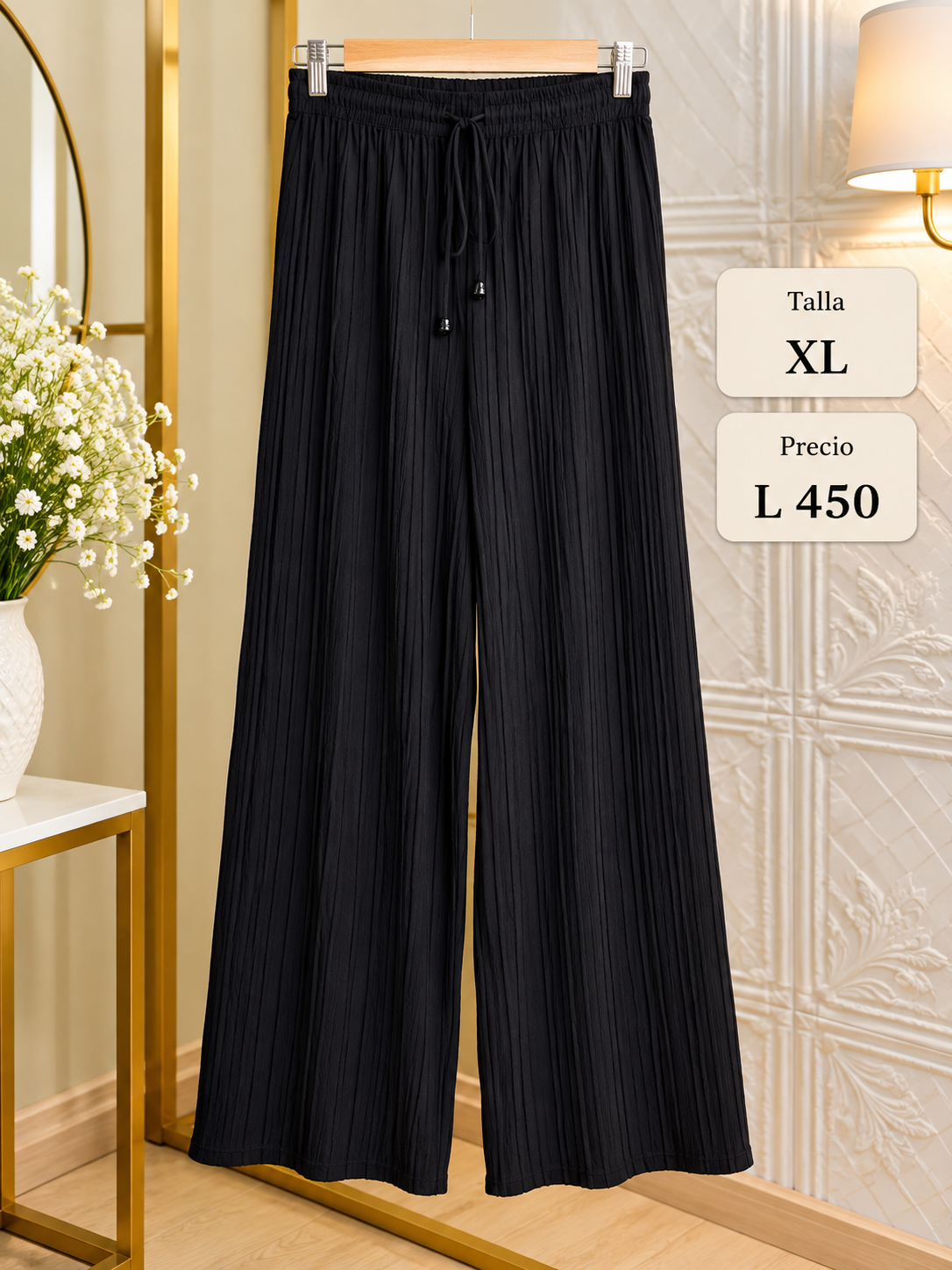 Pantalón palazzo negro de cintura elástica con diseño fluido