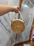 Bolso de mimbre con funda de tela por dentro