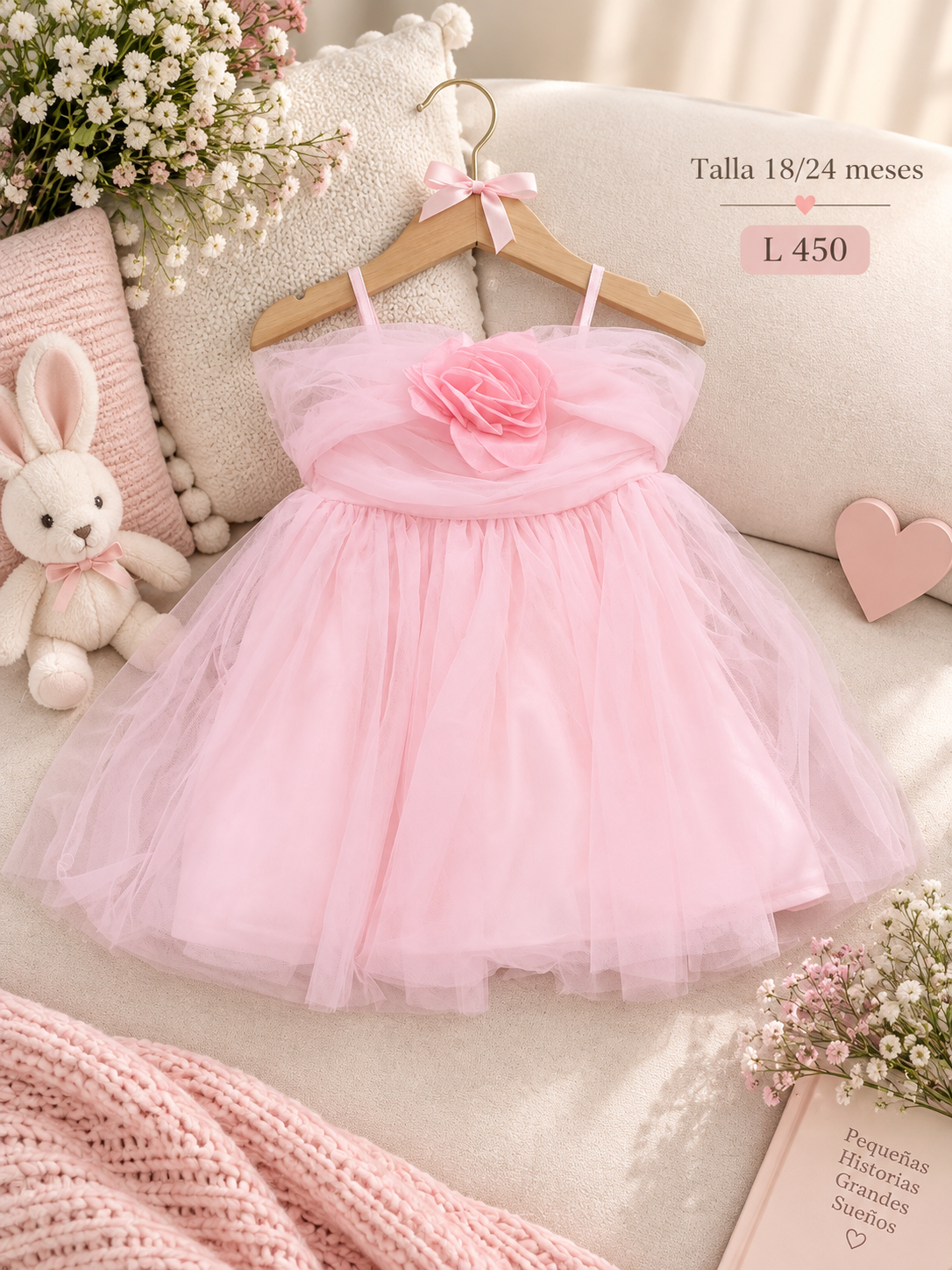 Vestido tierno para bebé de tul rosa decorado con una delicada flor