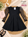 Vestido negro para niña con mangas largas de malla transparente y lunares