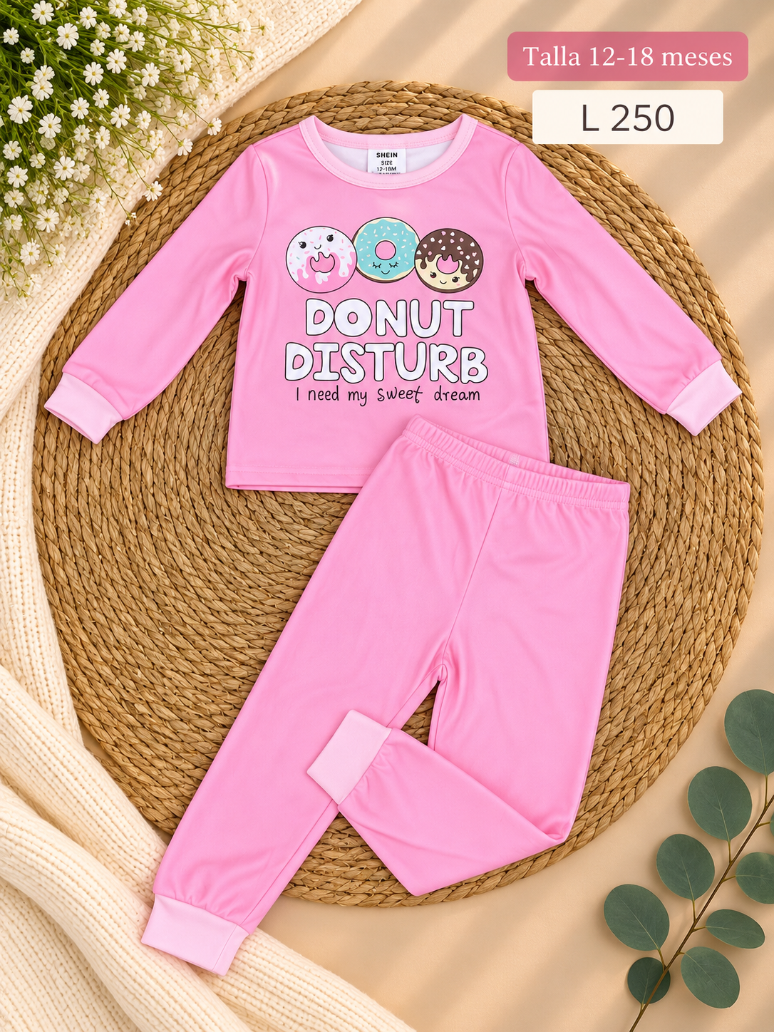 Conjunto para niña de pijama rosa con estampado de donas