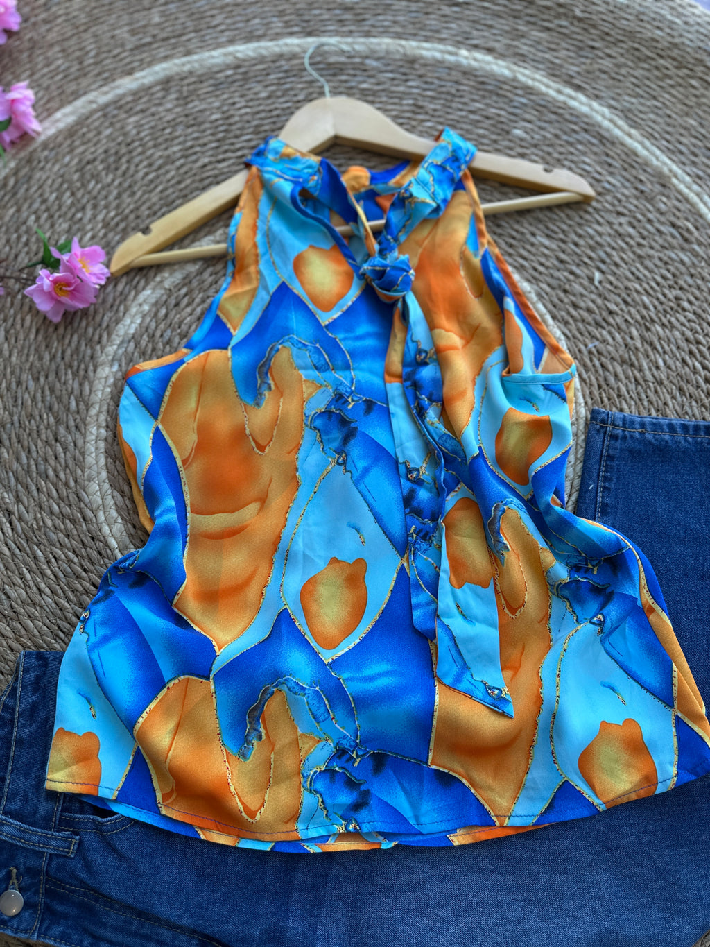 Blusa con cuello halter con estampado abstracto