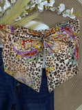 Top de moda con estampado animado y animal print